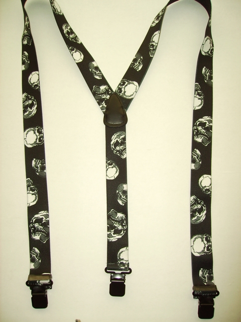 1 1/2" wide. "Y" Style. Choose from Assorted SIZES from 5' 1" to  7' 4" Height. (42" to 60" long Straps) Cotton/Polyester, hand washable-hang to dry Suspenders with Straps that are stretchable for entire length of the material with 3 Strong Stainless Steel 1"x 1" Grips and 2 Stainless Steel Length Adjusters in the front.   SKULLS             Y-UA/B2200N-SKUL